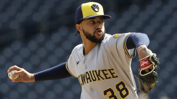 Brewers reliever Devin Williams throws a pitch.
